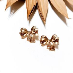 Gold bow stud earrings #794
